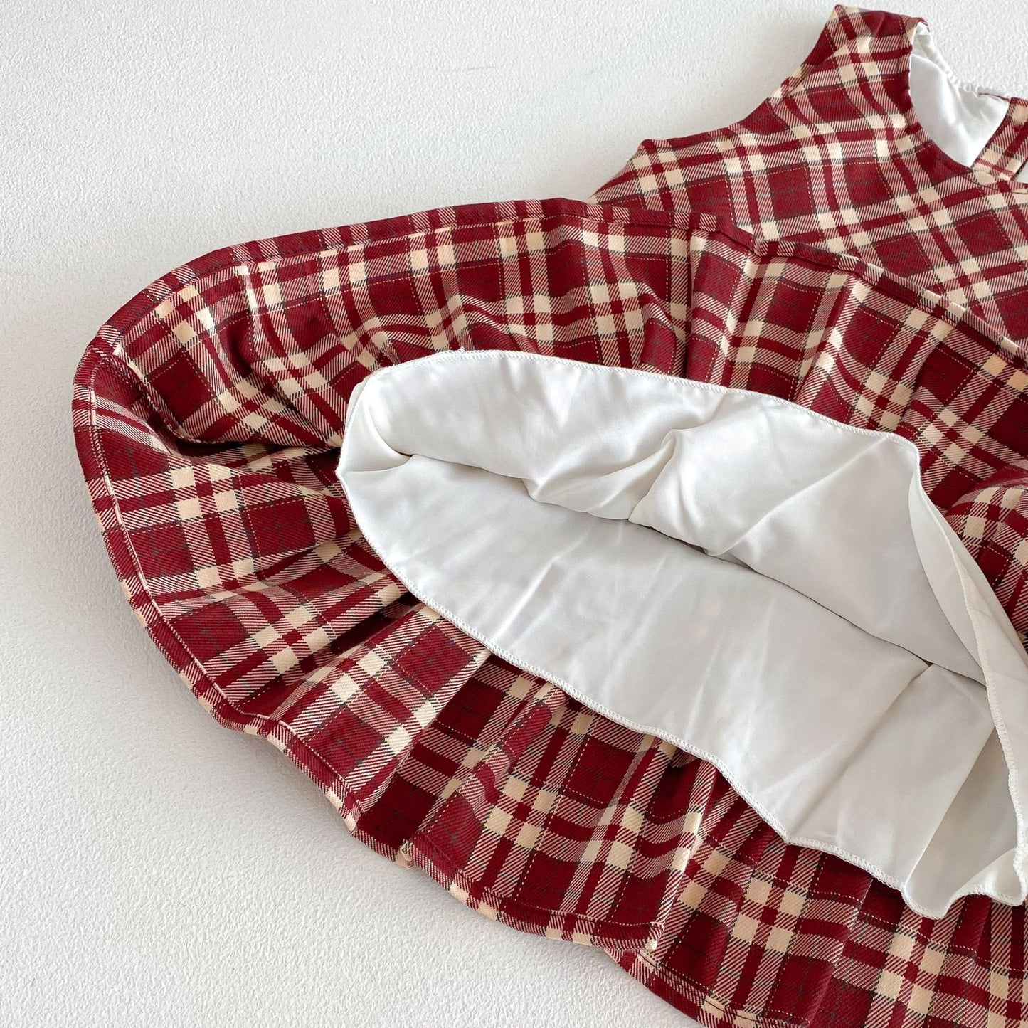 G26010109女童格子背心裙2026春秋新款中小童韓版無袖格子百褶裙新年服