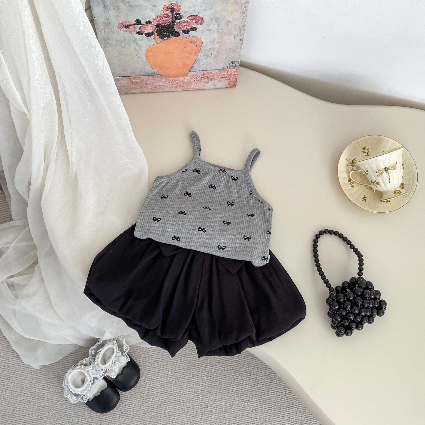 GN26030903ins夏季女童時尚小吊帶兩件洋氣百搭蝴蝶結T恤上衣+花苞短裤(2件起批)GN開頭需下單2款才有出貨,可混搭