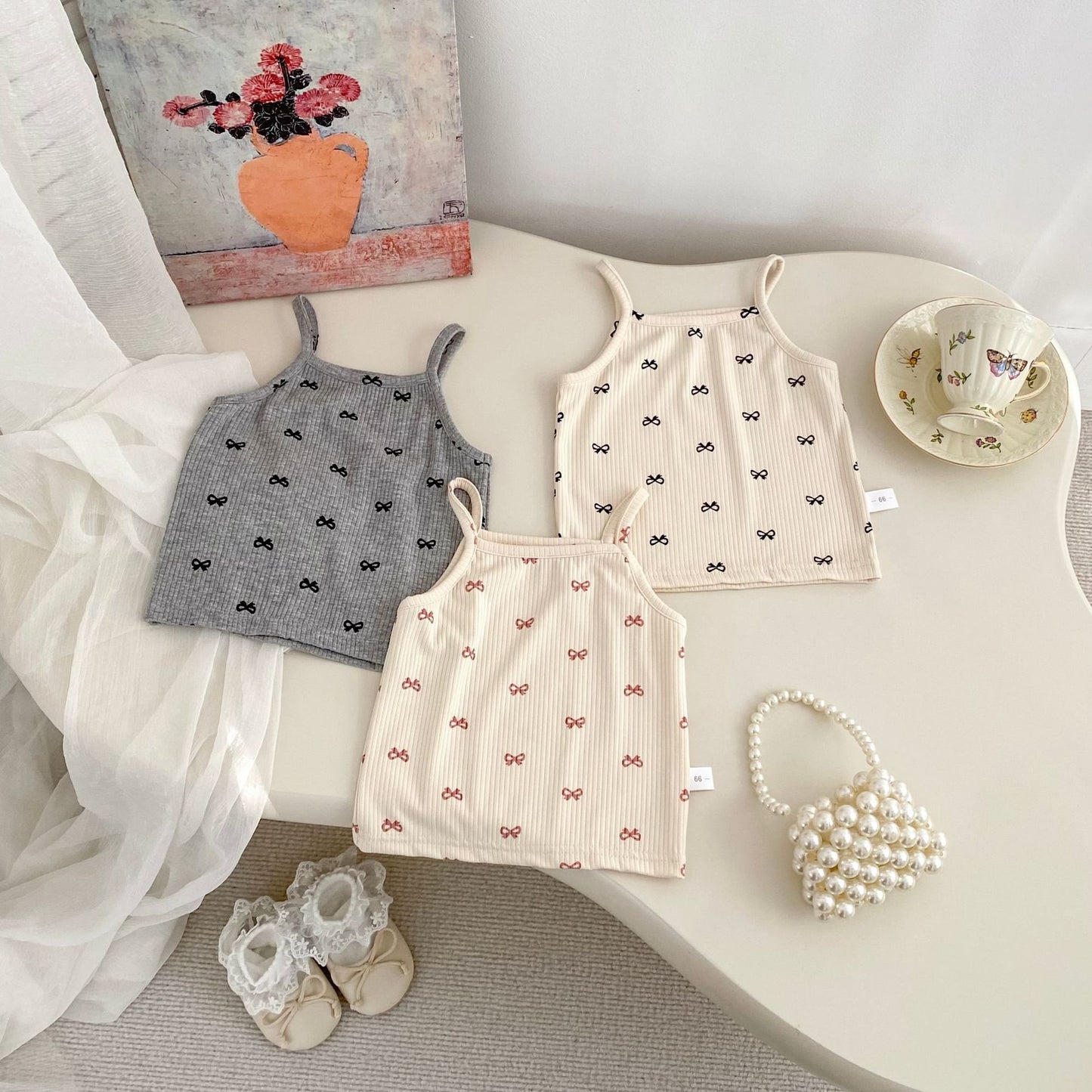 GN26030903ins夏季女童時尚小吊帶兩件洋氣百搭蝴蝶結T恤上衣+花苞短裤(2件起批)GN開頭需下單2款才有出貨,可混搭